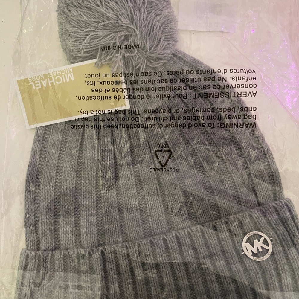 Michael Kors gray pompom hat.